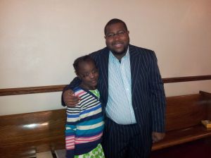 Rev. Jermine Alberty and Deshonda Burgess greet one another at the end of the Oct. 6, service.  